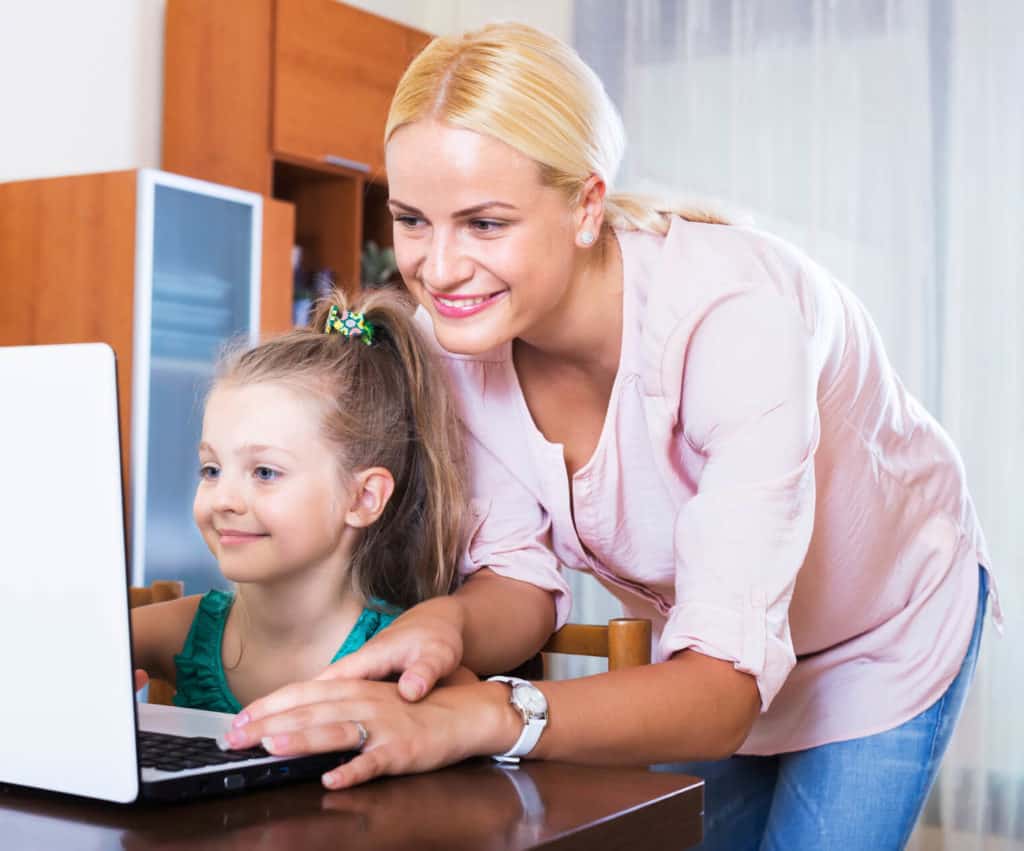 Mother and Daughter on Computer