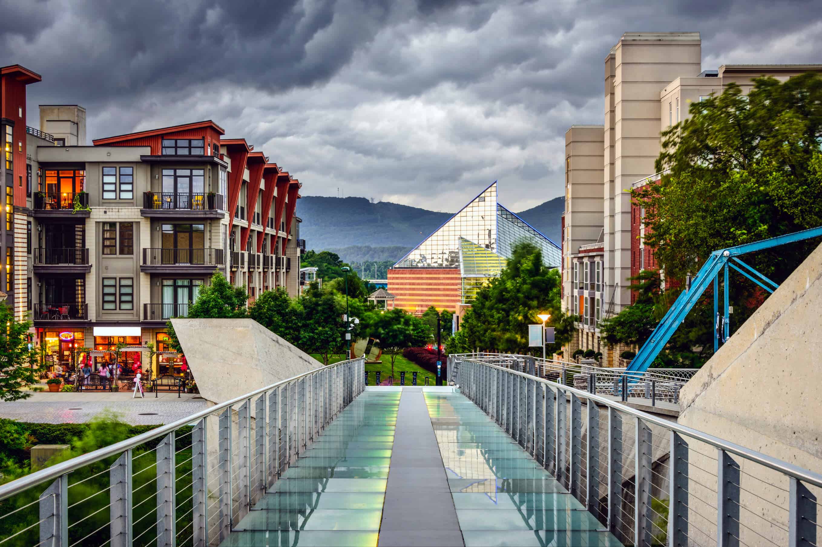 Chattanooga, TN, USA downtown cityscape under a stormy sky.