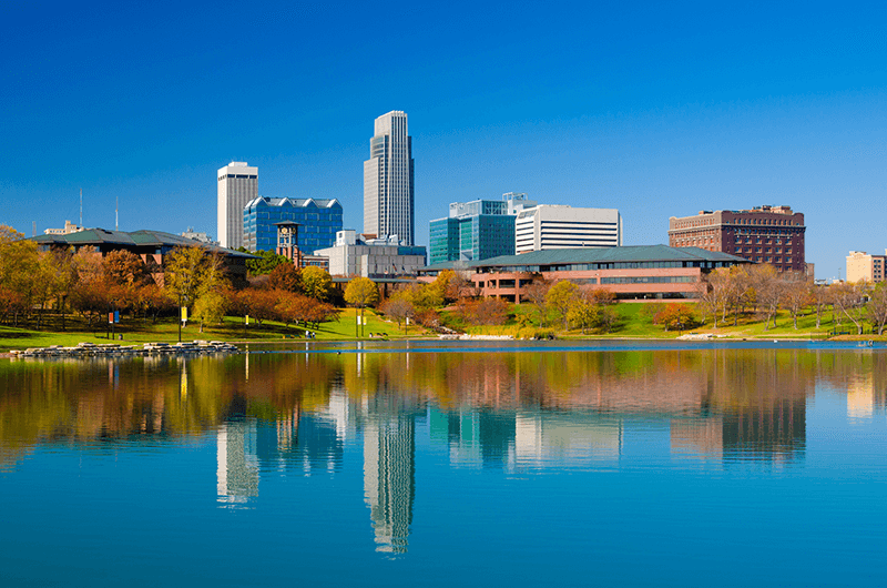 Omaha skyline with small pond in the foreground