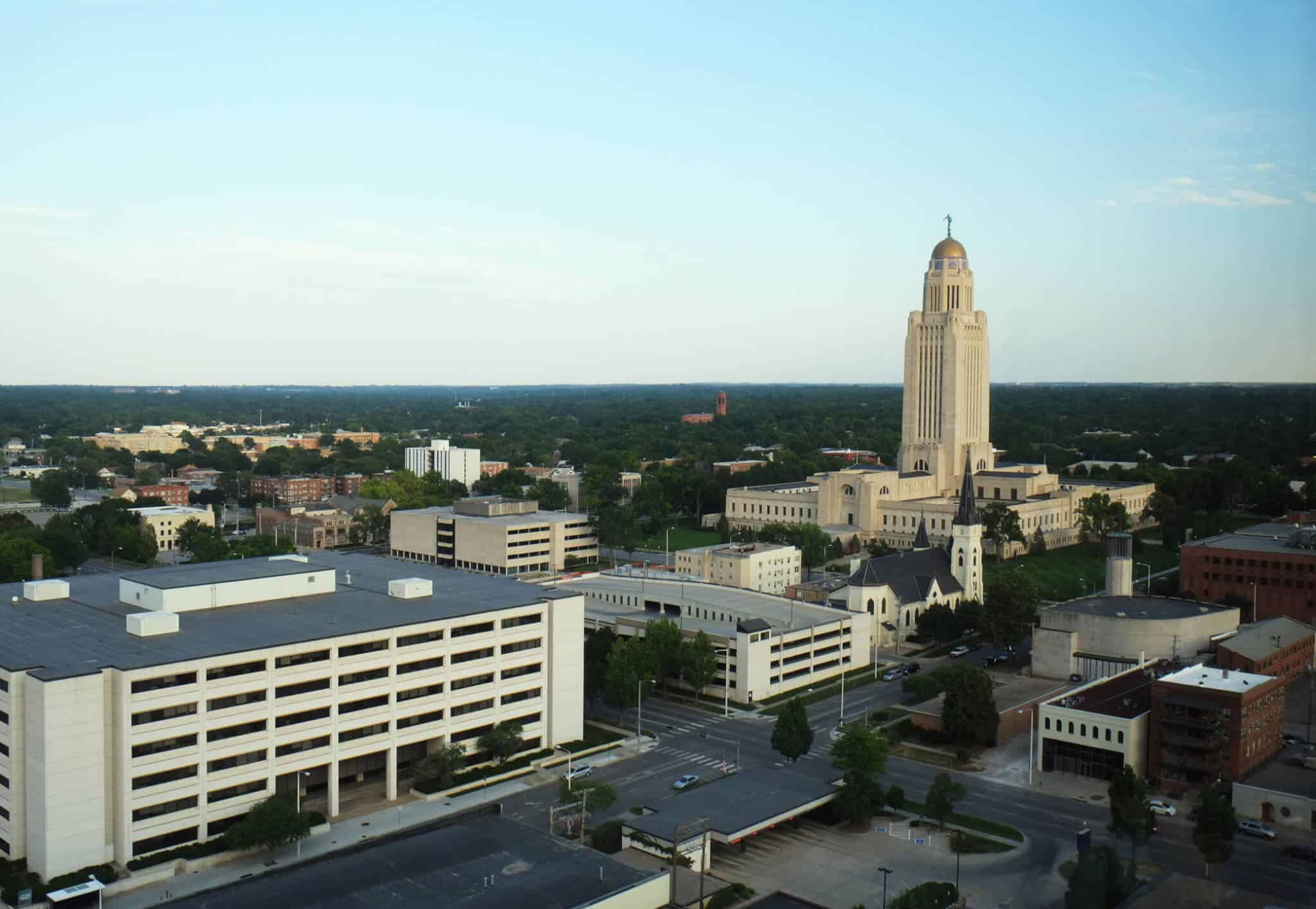 Elevated view of Nebraska State Capitol and surroundings.