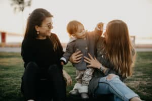 Mother and daughter having fun outdoors